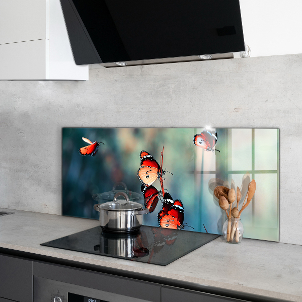 Sklenený obklad do kuchyne Jemný motýľ vo vetre