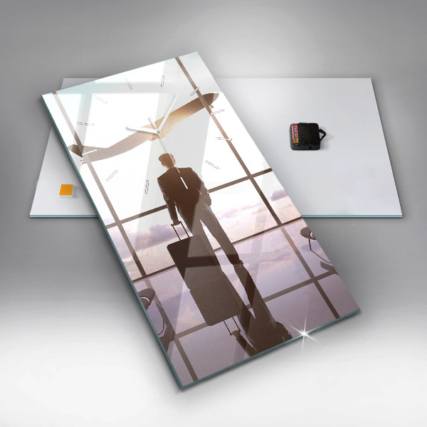 Vertikálne hodiny Muž na letisku