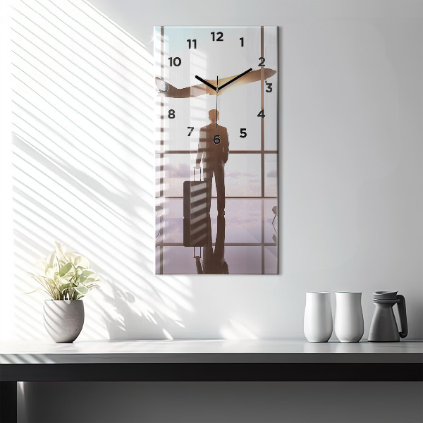 Vertikálne hodiny Muž na letisku