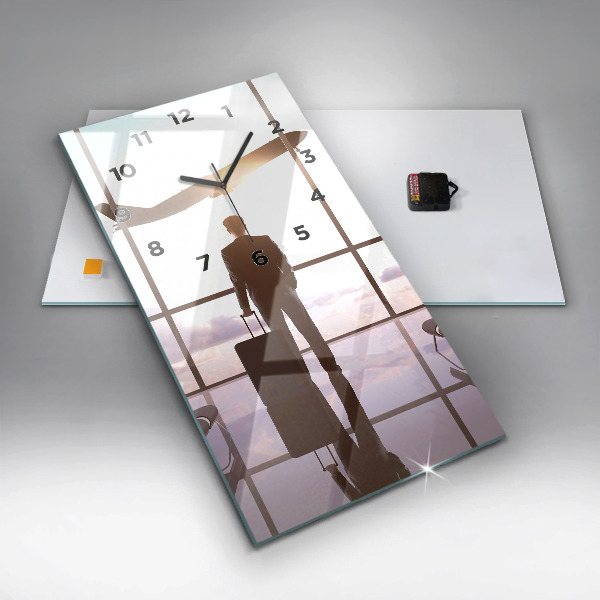 Vertikálne hodiny Muž na letisku