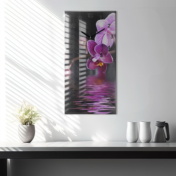 Vertikálne hodiny Kvet orchidey na vode