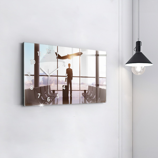 Horizontálne hodiny Muž na letisku