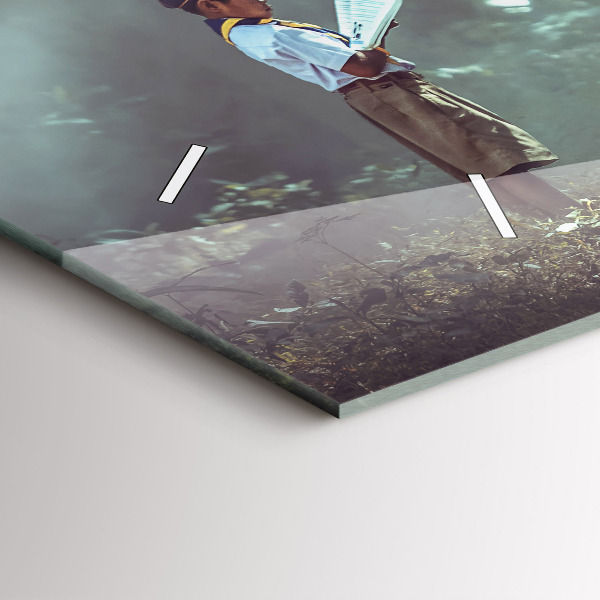 Horizontálne hodiny Chlapec číta knihu