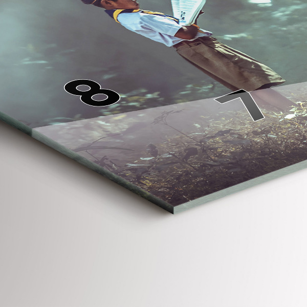 Horizontálne hodiny Chlapec číta knihu