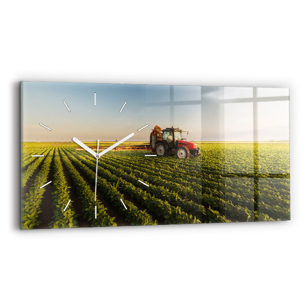 Horizontálne hodiny Traktor postrekuje pole