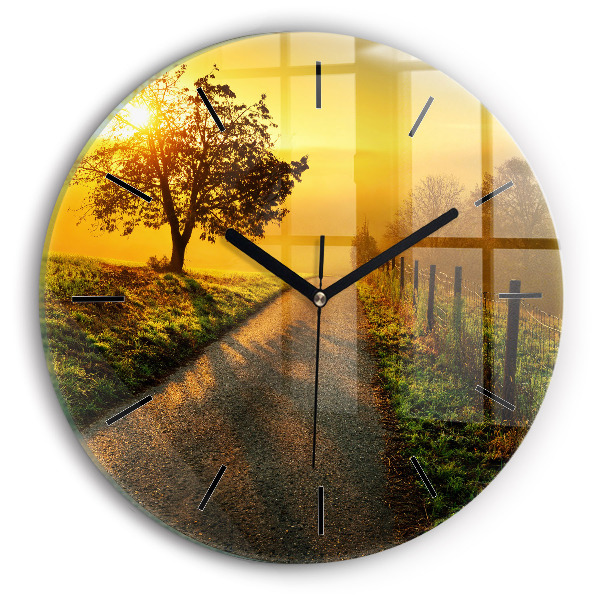 Okrúhle hodiny Hmla pri východe slnka