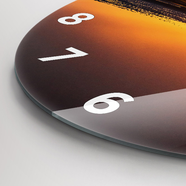 Okrúhle hodiny Bežec a západ slnka